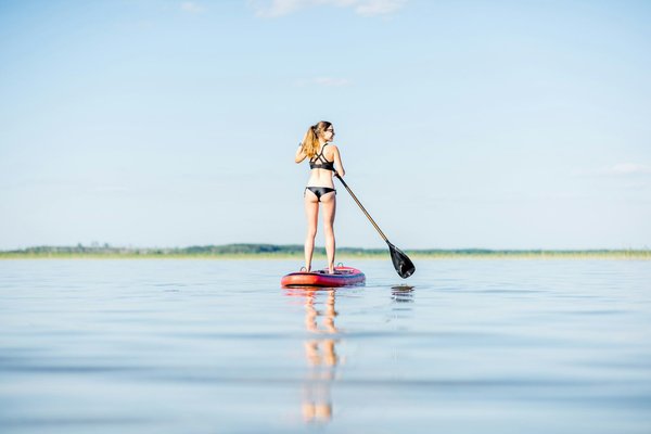 How Does Regular Paddle Boarding Contribute to Core Strength and Balance?